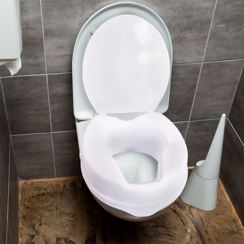 Elevador WC para Adulto Sin Tapa 10 cm Adaptable a inodoros ovalados  Sistema de fijación Lateral Marca española Modelo Titán